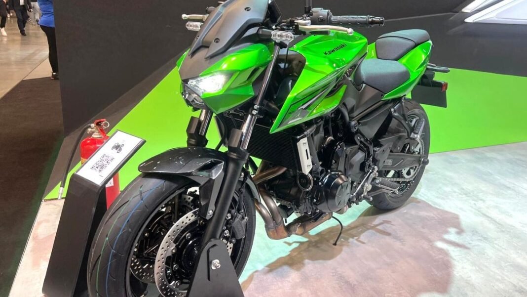 A green and black Kawasaki Z-series streetfighter motorcycle on display