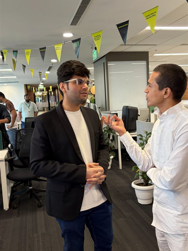 Tushar Madaan in conversation with a guest at the workshop